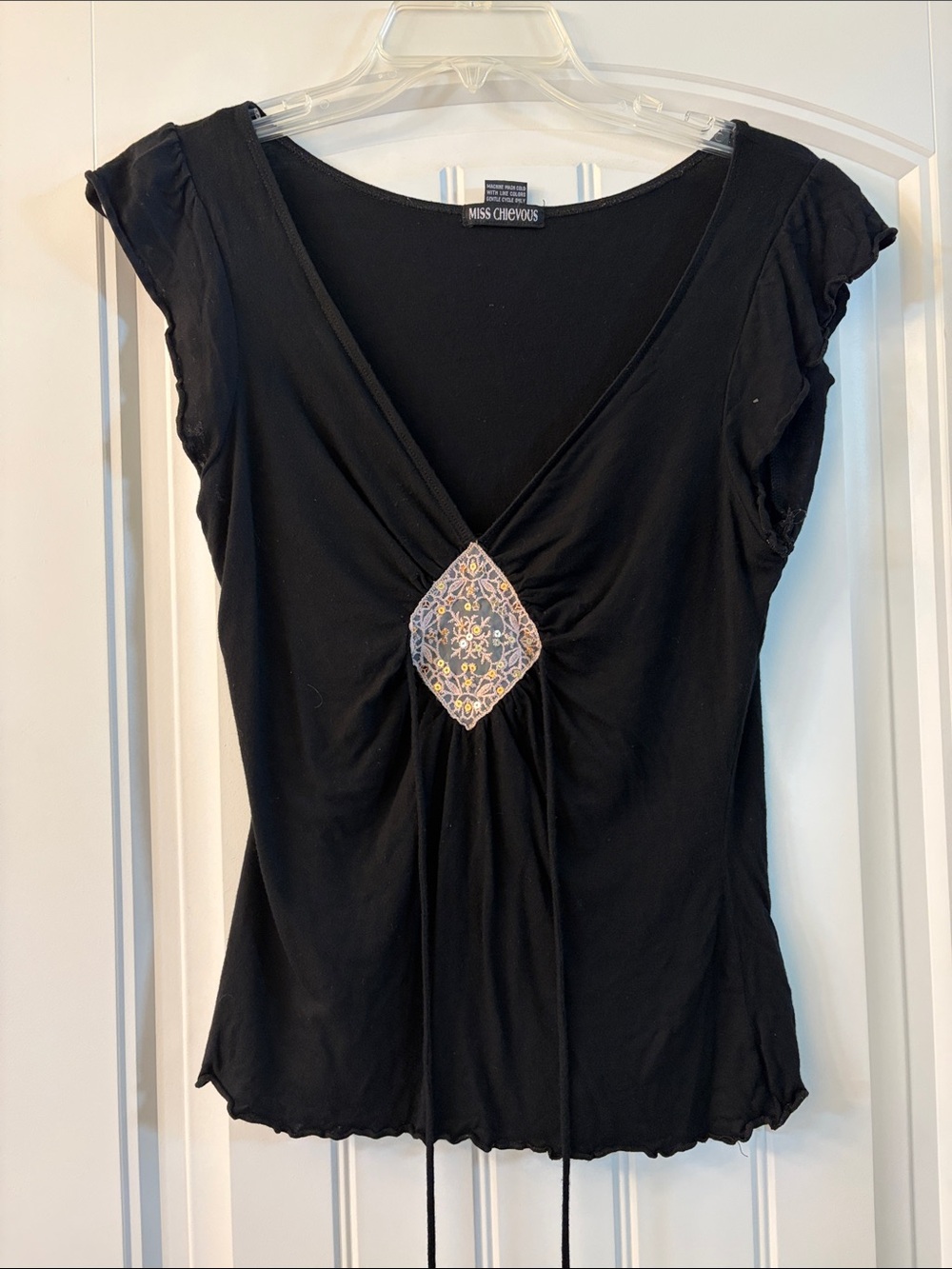 Miss Chievous Black V-Neck Short Sleeve Top with Embroidered Medallion